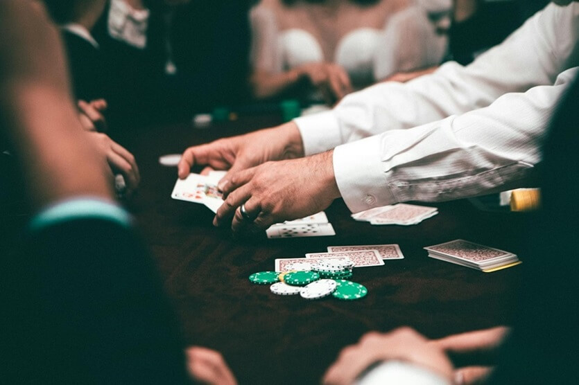 А croupier that deals cards during a poker game