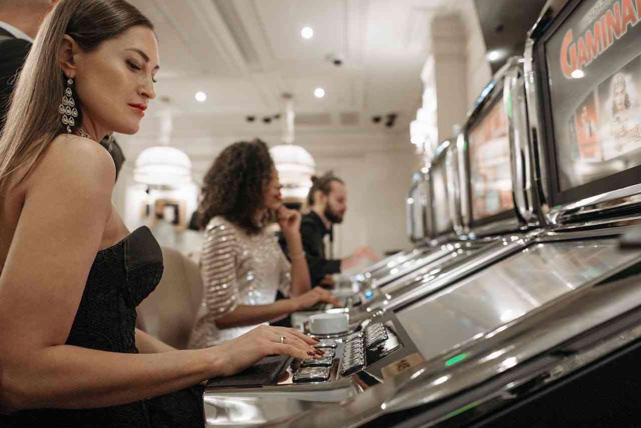 Woman playing progressive slots